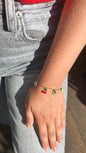 Vrolijke zomerse armband goud